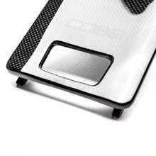 Load image into Gallery viewer, COBB Driver's Side Carbon Fuse Cover 2012-2017 Porsche 911 Carrera / 2013-2016 Porsche Boxster / 2017-2024 Porsche 718 Boxster / 2014-2016 Porsche Cayman